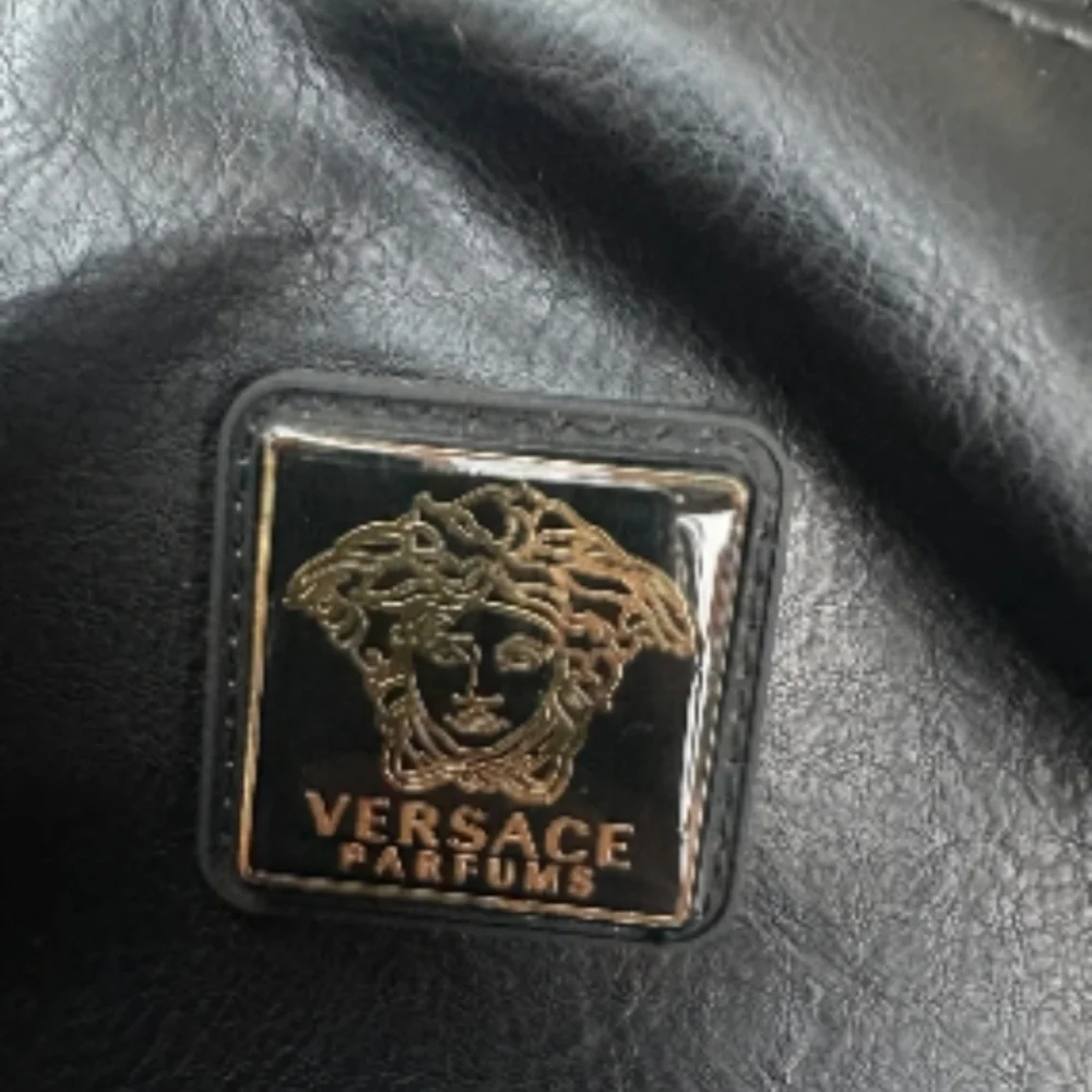 Versace Black Backpack with Gold Accents - Picture 4 of 11